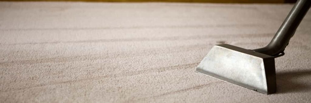 This is a photo of a carpet steam cleaner cleaning a cream carpet works carried out by Rickmansworth Carpet Cleaning