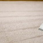 This is a photo of a carpet steam cleaner cleaning a cream carpet works carried out by Rickmansworth Carpet Cleaning